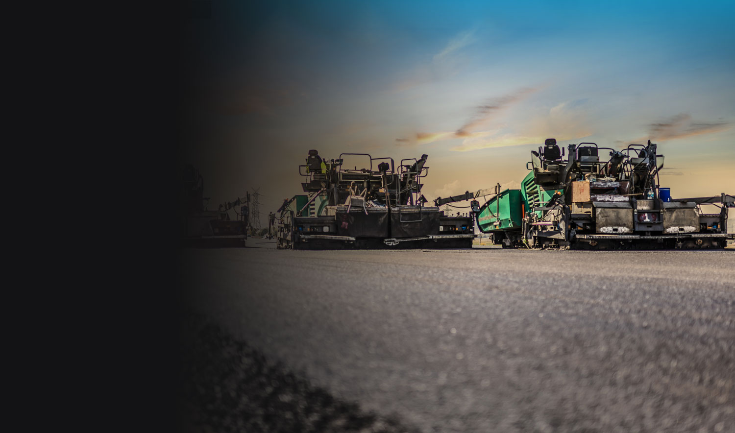 Asphalt paving equipment laying asphalt on a road, Arrow Asphalt LLC paving services.