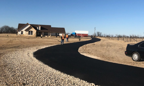 New asphalt driveway installation and resurfacing for residential property in Oklahoma City