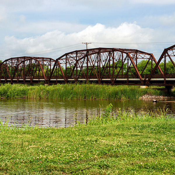 Historic bridge over water in Bethany, Oklahoma, showcasing local infrastructure.